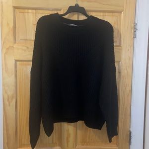 A crop black sweater size 3X